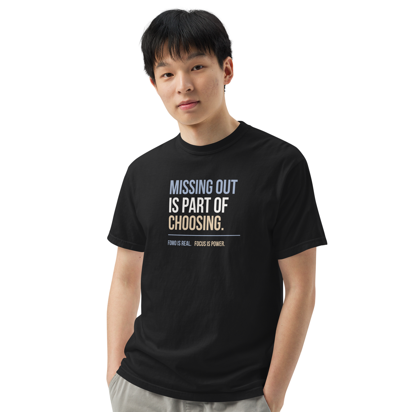 Missing Out Is Part of Choosing unisex heavyweight t-shirt in black, angled front view