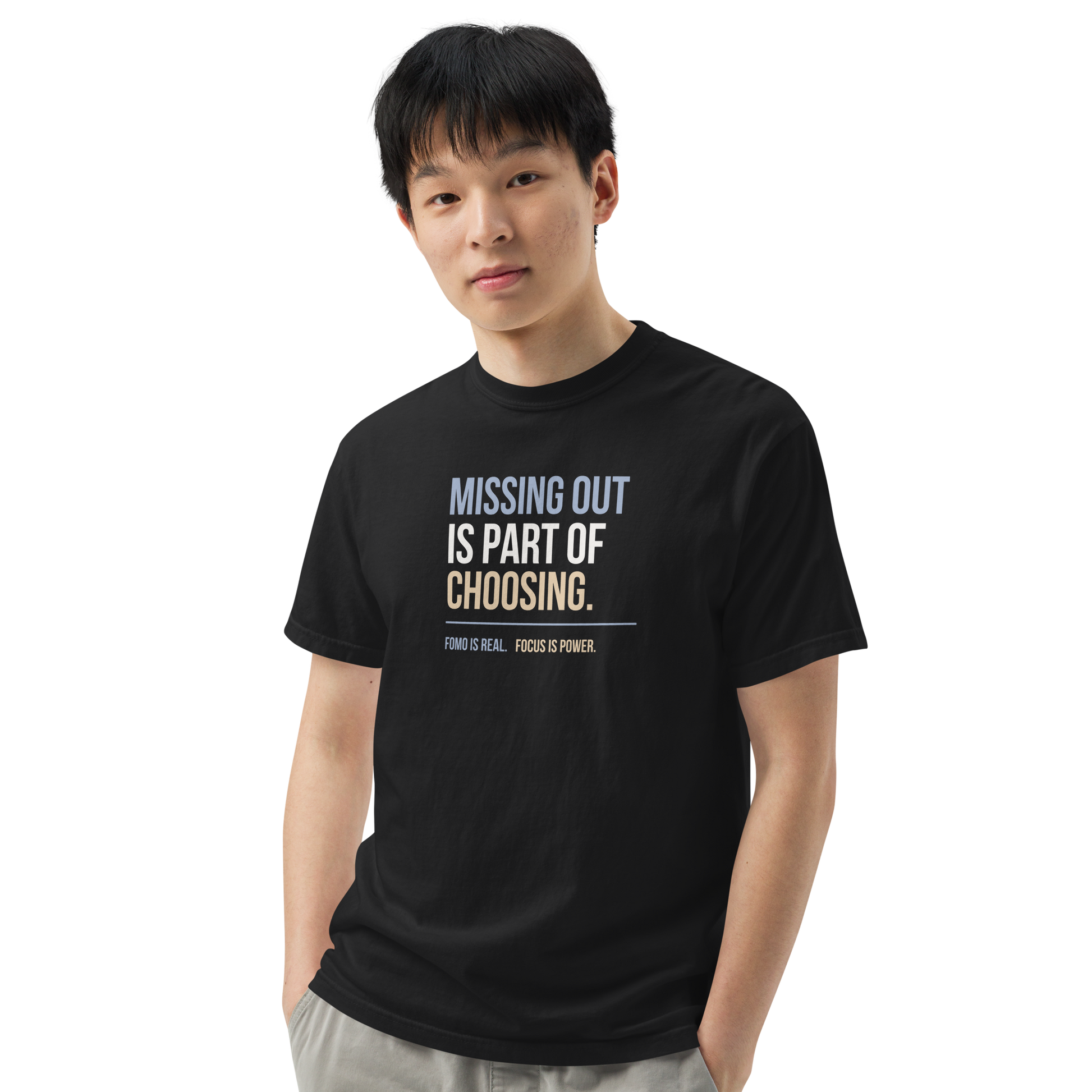 Missing Out Is Part of Choosing unisex heavyweight t-shirt in black, angled front view