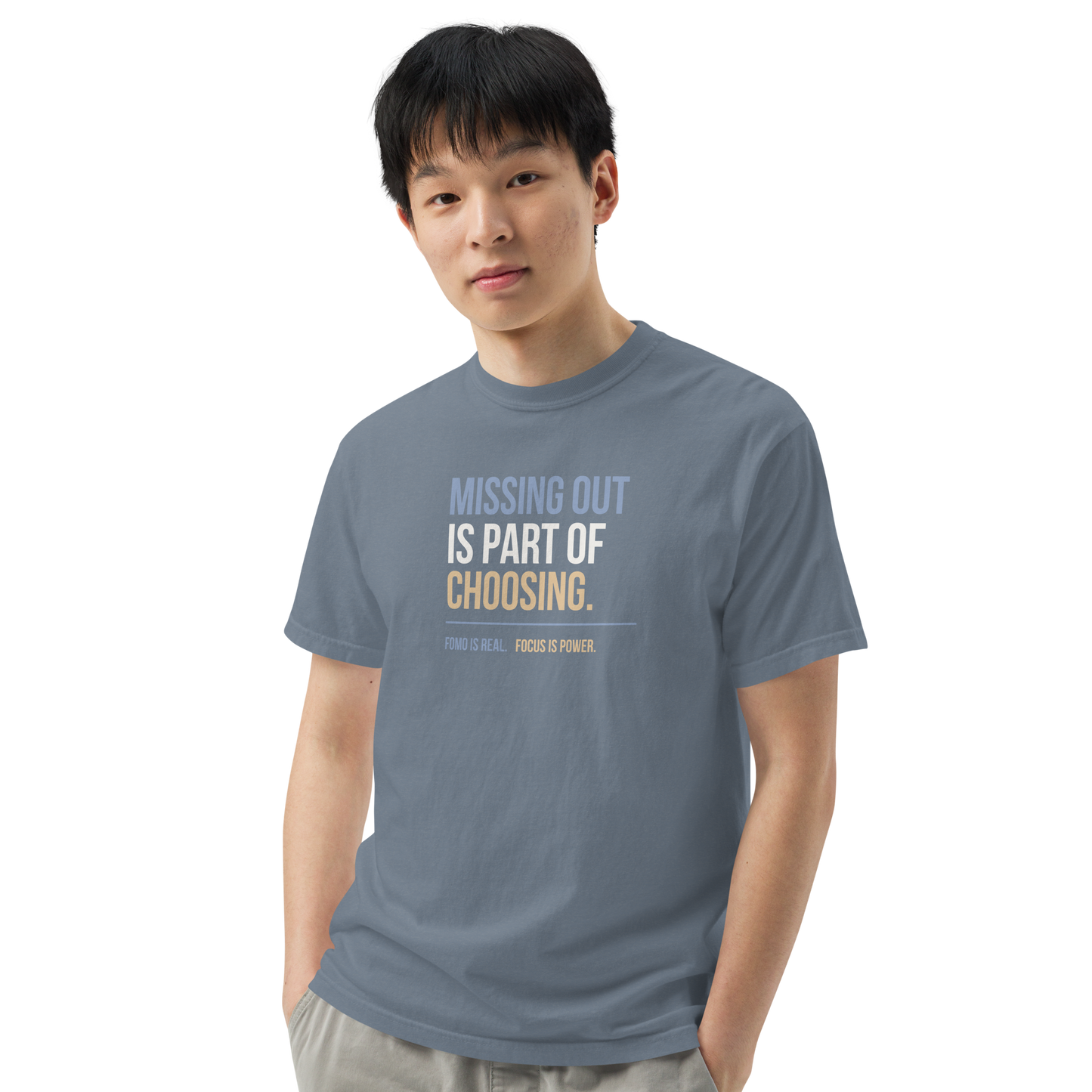 Missing Out Is Part of Choosing unisex heavyweight t-shirt in blue jean, angled front view