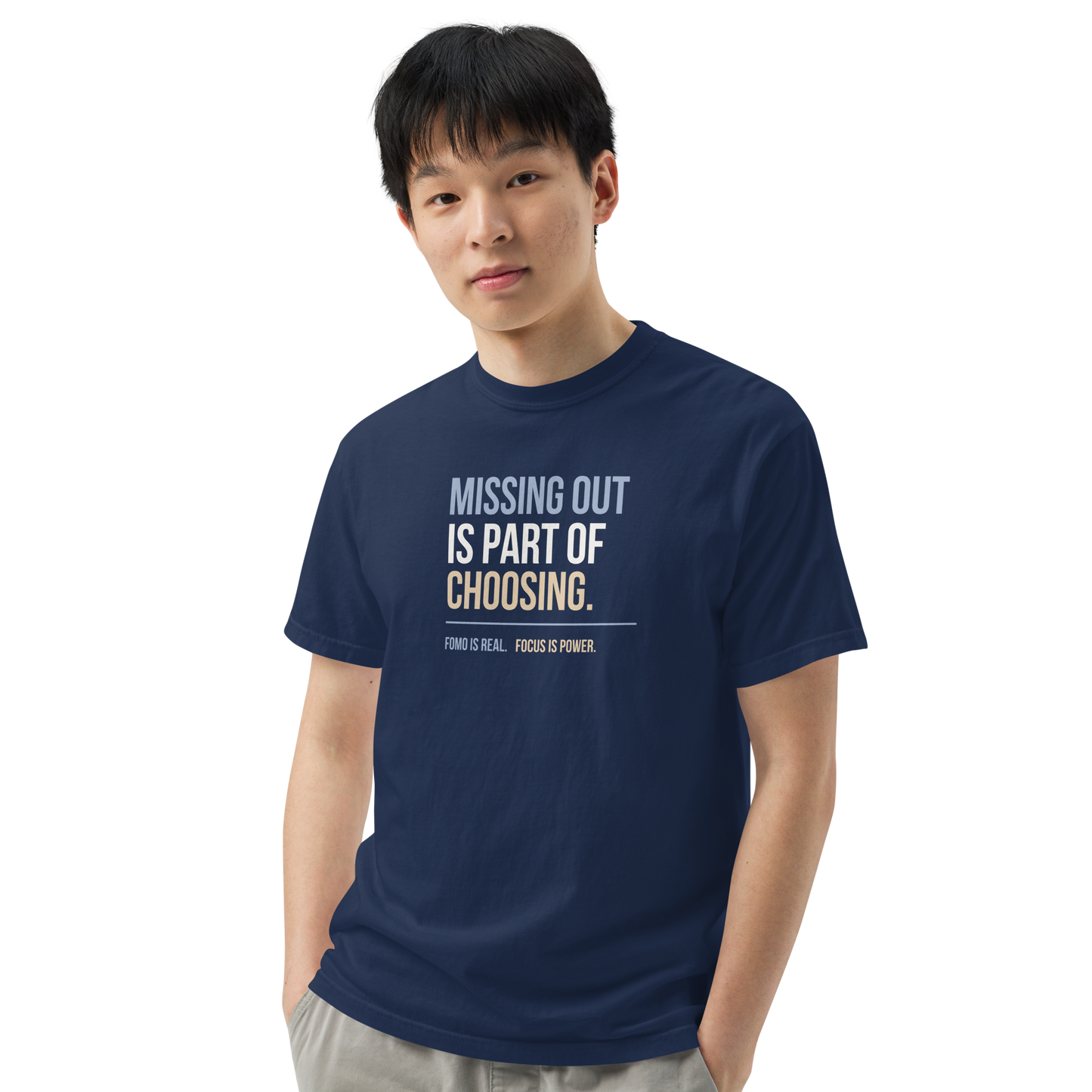 Missing Out Is Part of Choosing unisex heavyweight t-shirt in true navy, angled front view